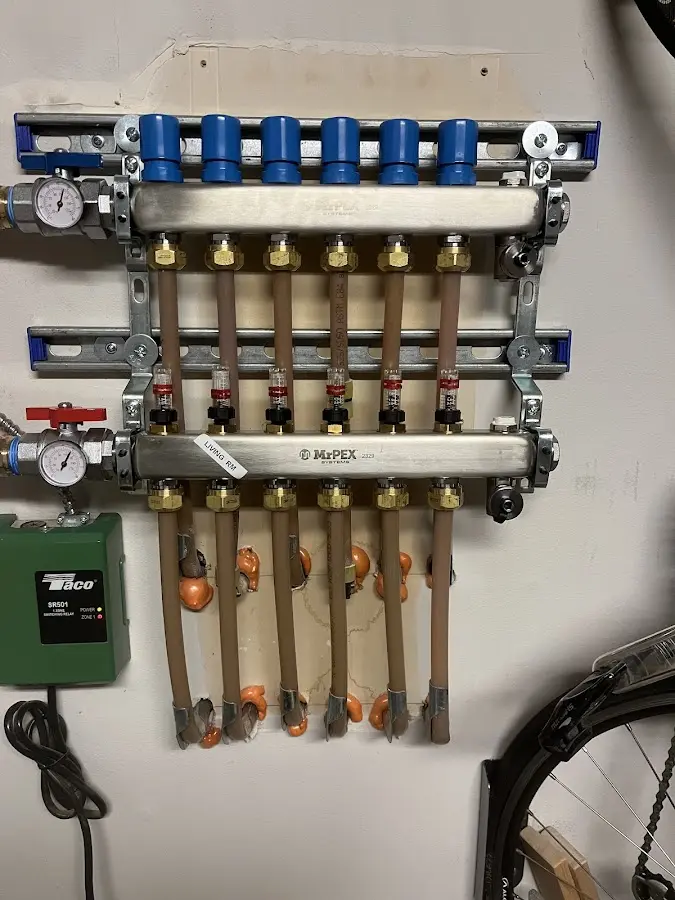 Plumber performing Water Heater Repair at a residential property in Eatontown